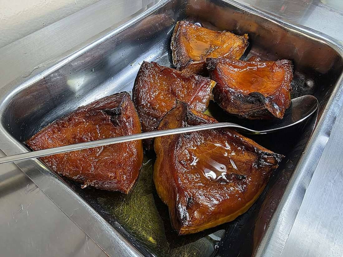 Calabazas al horno con almibar en restaurante de Argentina
