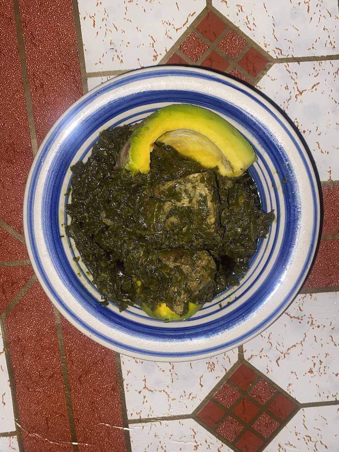 Sombe sauce with meat and ovacado 01 (Cassava Leaves)