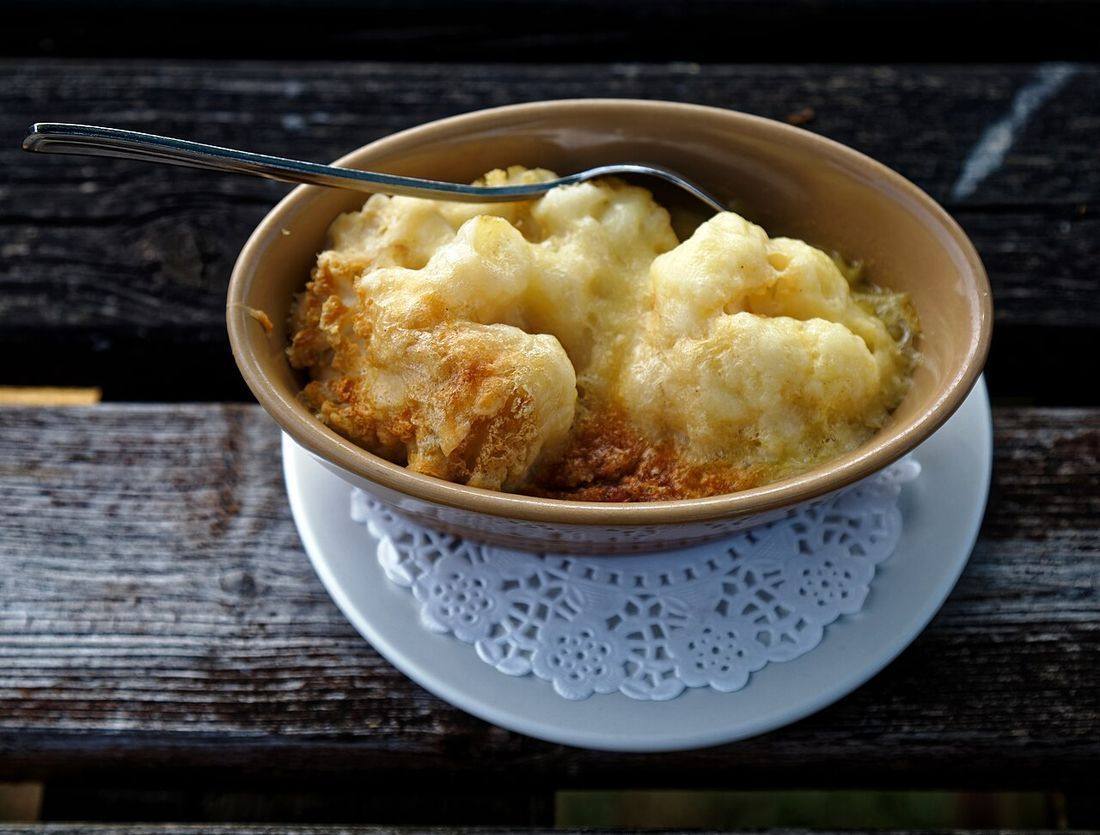 Cauliflower cheese side dish for Sunday roast at The Black Bull, Fyfield, Essex, England