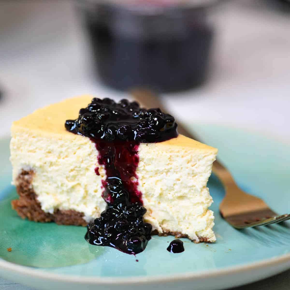 A slice of cheesecake with berries