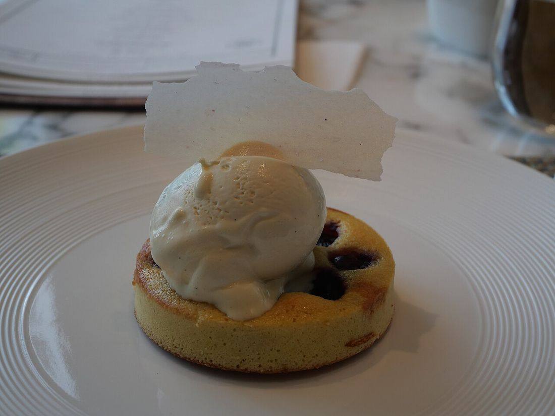Cherry clafoutis with vanilla ice cream in Mohk