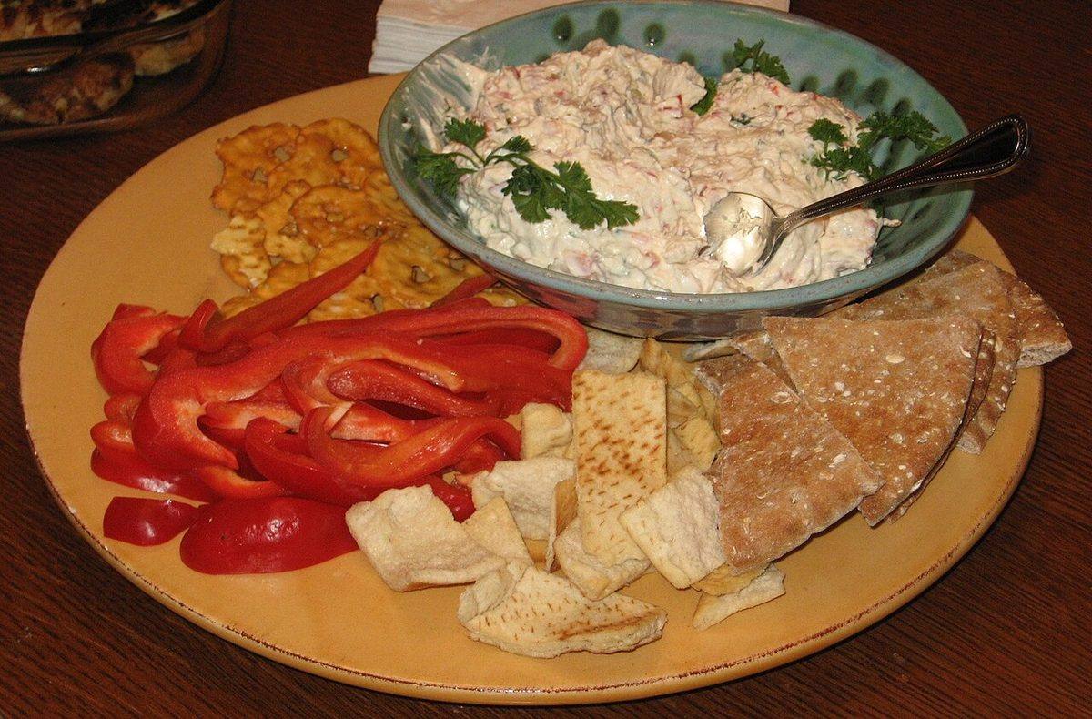 Chunky clam dip with various dipping foods (Clam Dip)