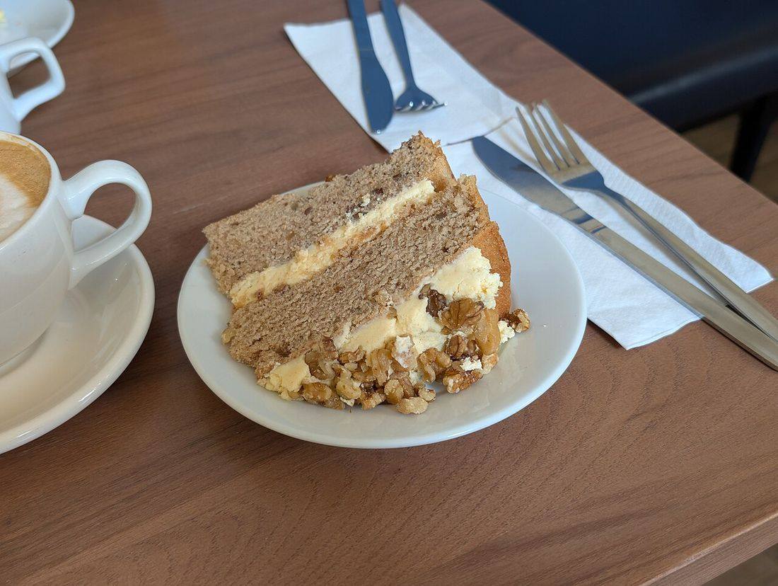 A slice of coffee and walnut cake - Audit Room Café, Petworth House (Coffee Cake)