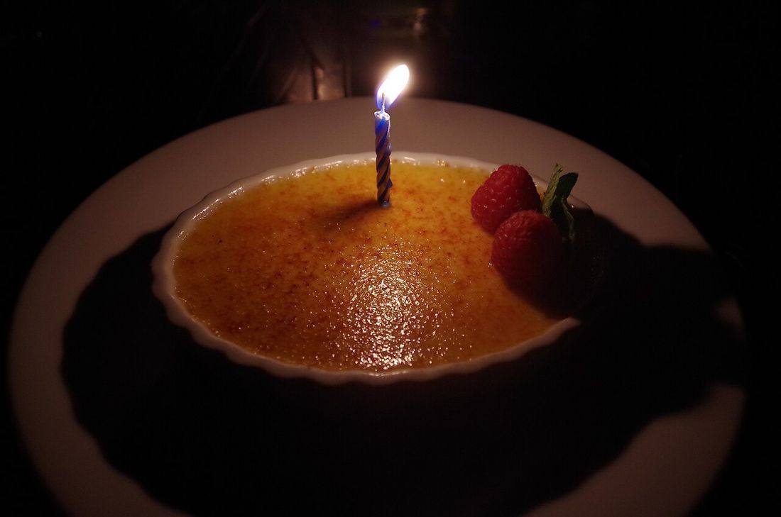 Crème Brûlée with Raspberries and Candle (Creme Brulee)