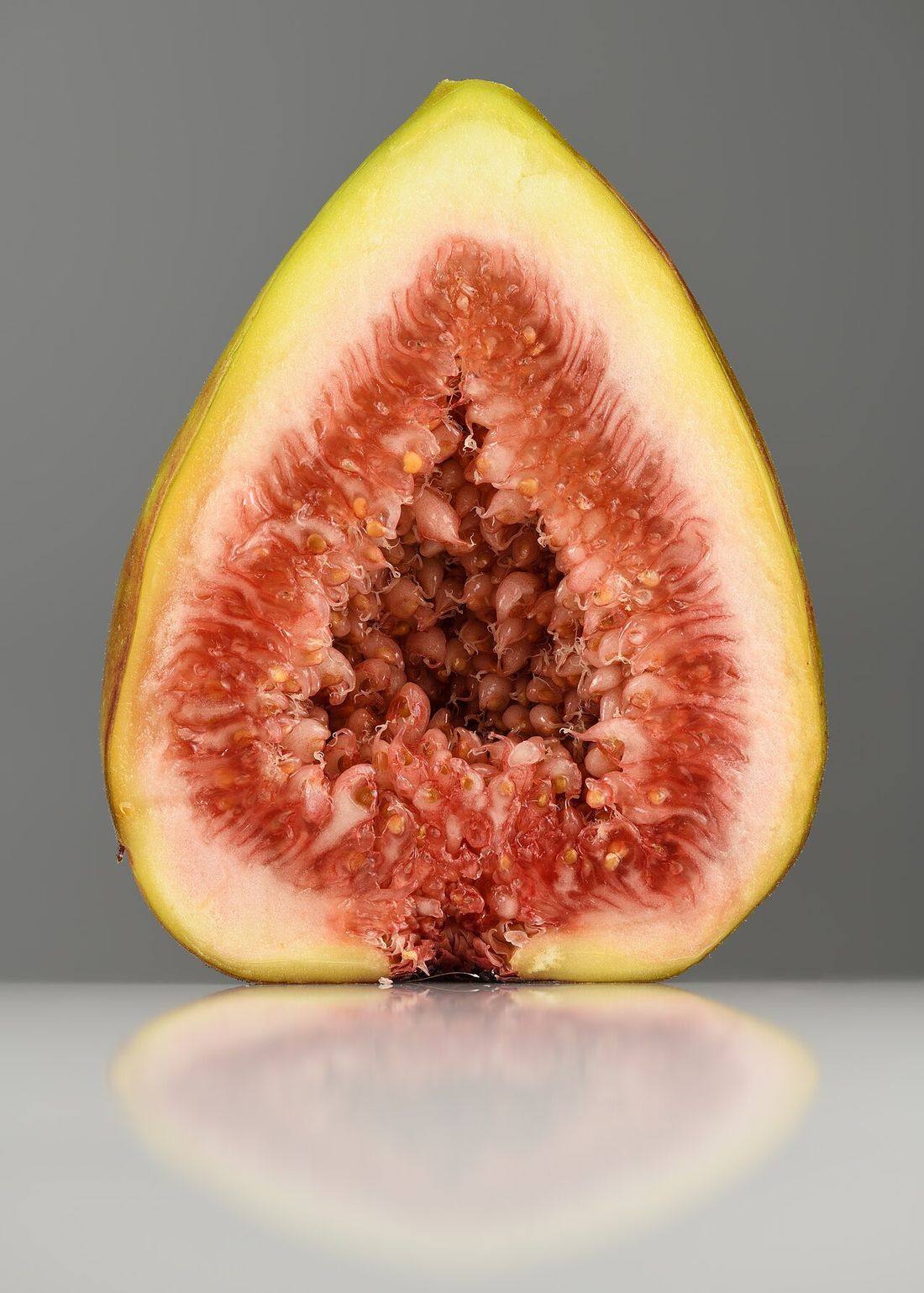 Fig (Ficus carica) fruit halved (Figs)