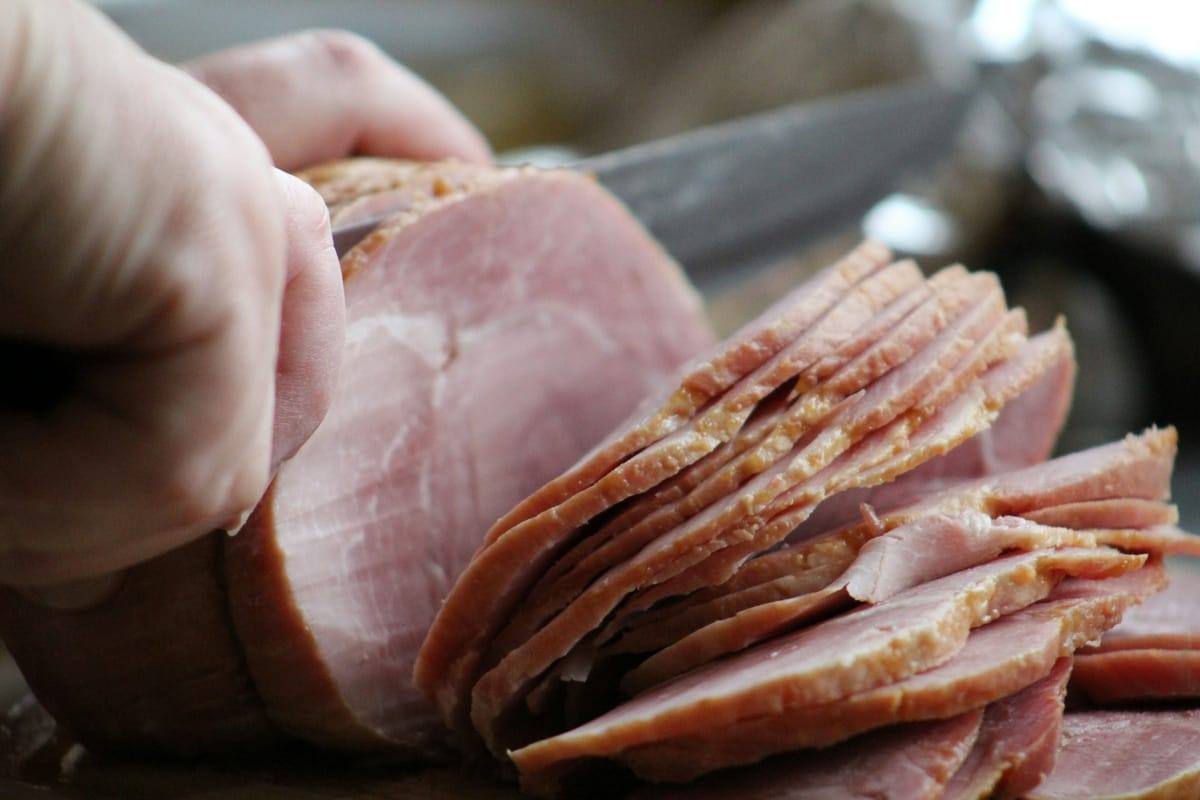 Sliced ham on a board