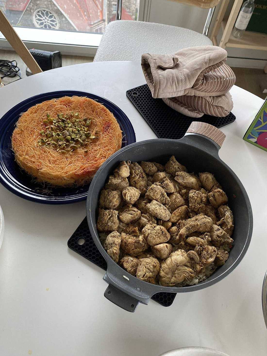Chicken with Yemeni mandi spices over rice and knafeh