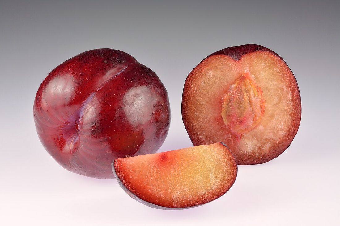 Plums African Rose - whole, halved and slice