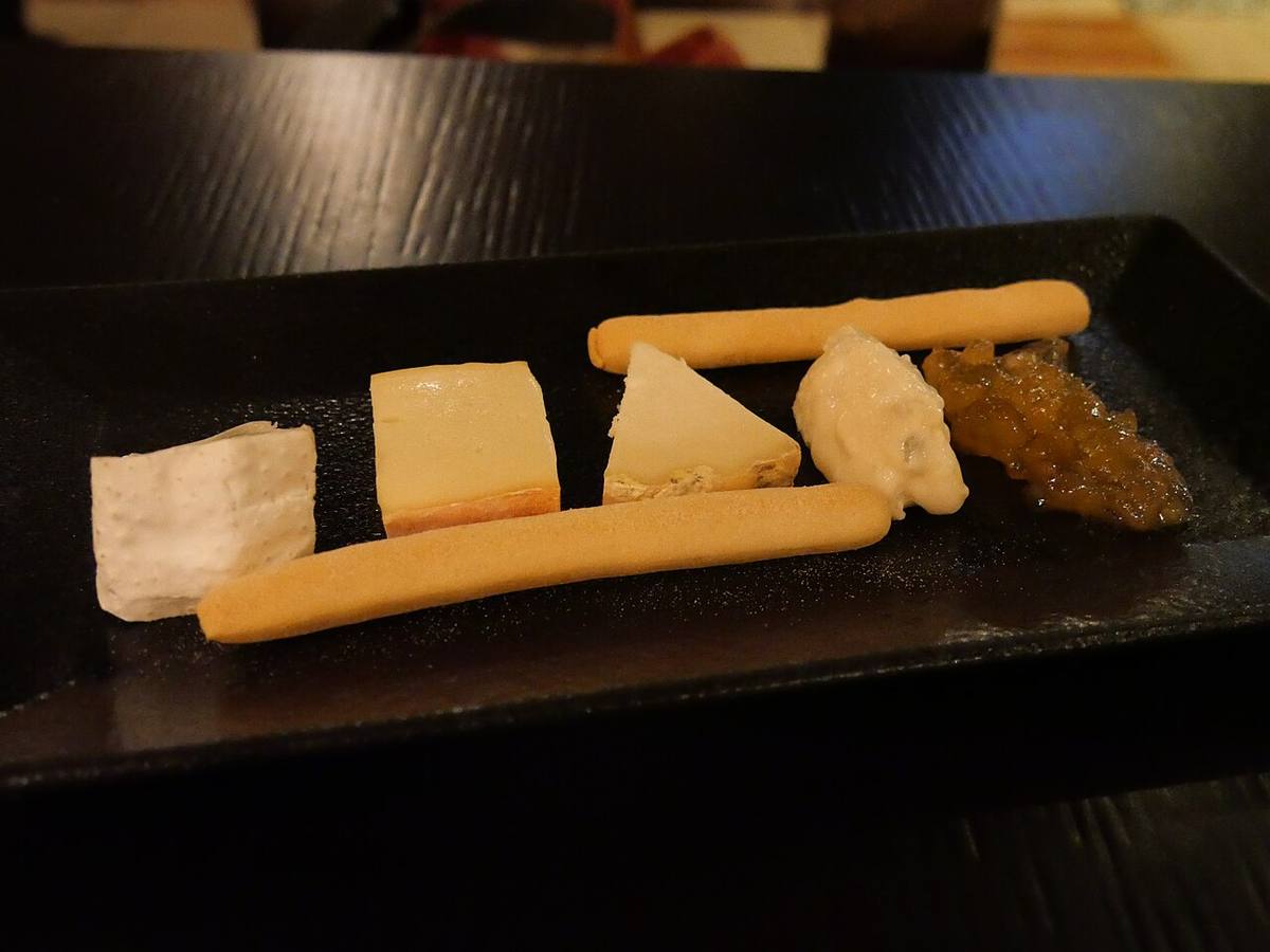 Four cheese plates with fruit jam (Robiola)