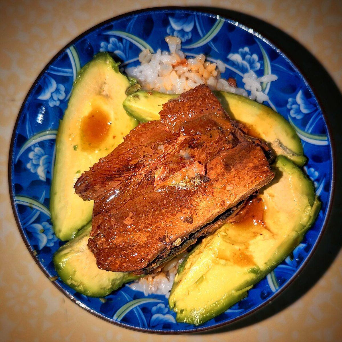 Saury and avocado on white rice with tamari soy sauce - Massachusetts (Saury)
