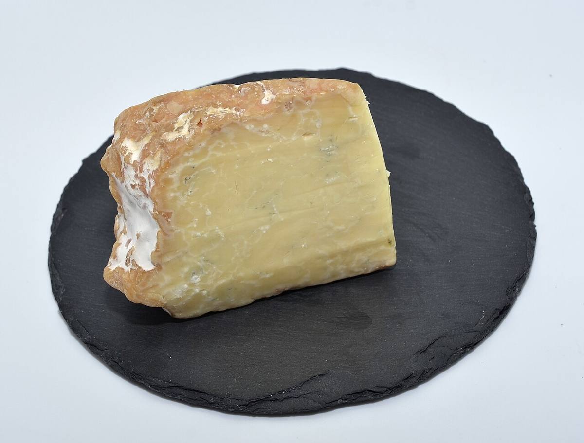 A Goat Cheese Roll and Swiss Grated Cheese (Swiss Cheese)